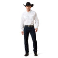 Man wearing a white shirt, dark jeans, and a black cowboy hat on a white background