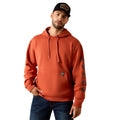 Man wearing an orange hoodie and black cap on a white background