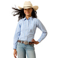 Woman wearing a blue striped shirt, light blue jeans, and a cowboy hat on a white background