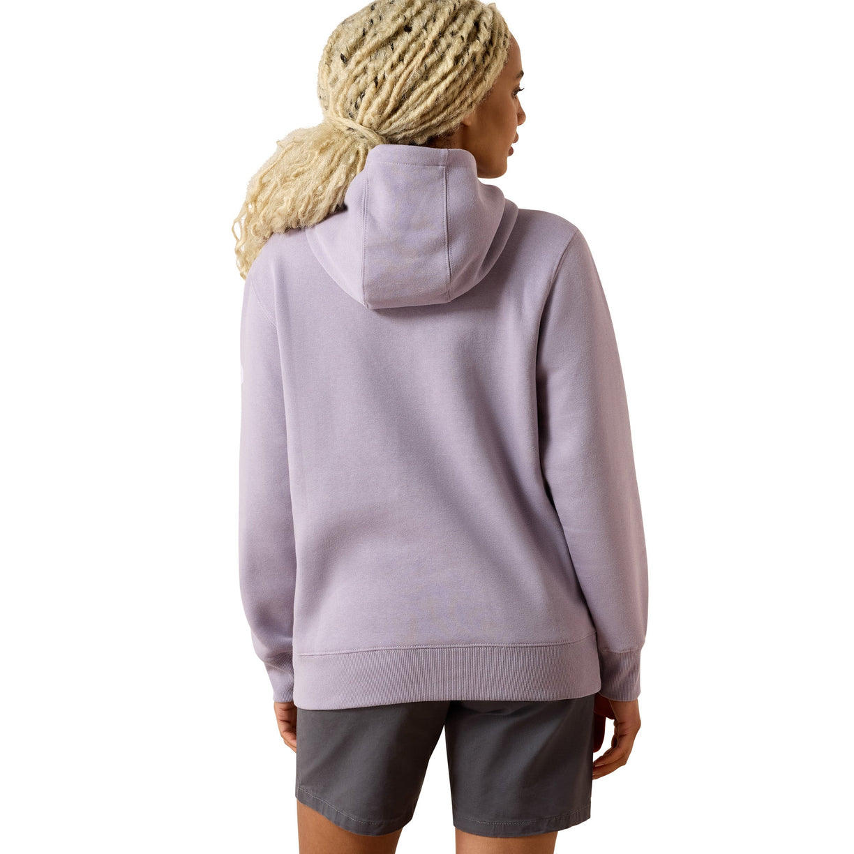 Person wearing a light purple hoodie and gray shorts on a white background