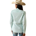 Person wearing a light green striped shirt and a straw hat on a white background