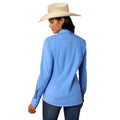 Person wearing a blue shirt and straw hat on a white background