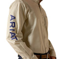 Beige jacket with 'Ariat' branding on a white background