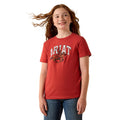 Girl wearing a red Ariat t-shirt on a white background