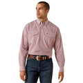 Man wearing a red patterned shirt and blue jeans on a white background