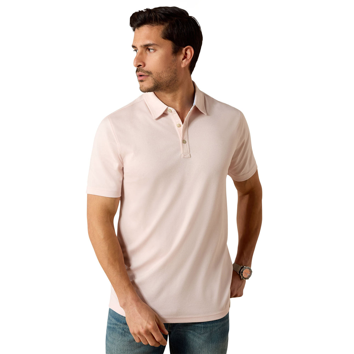 Man wearing a light pink polo shirt on a white background