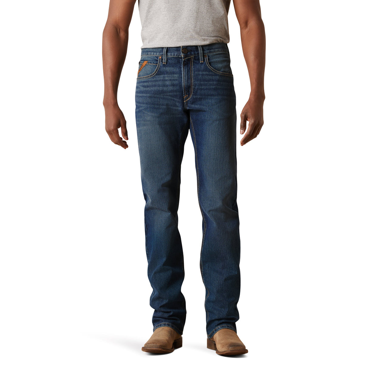 Person wearing blue jeans on a white background