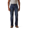 Person wearing blue jeans on a white background
