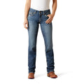 Person wearing blue jeans and a white top on a white background