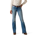 Person wearing blue jeans and a white shirt on a white background