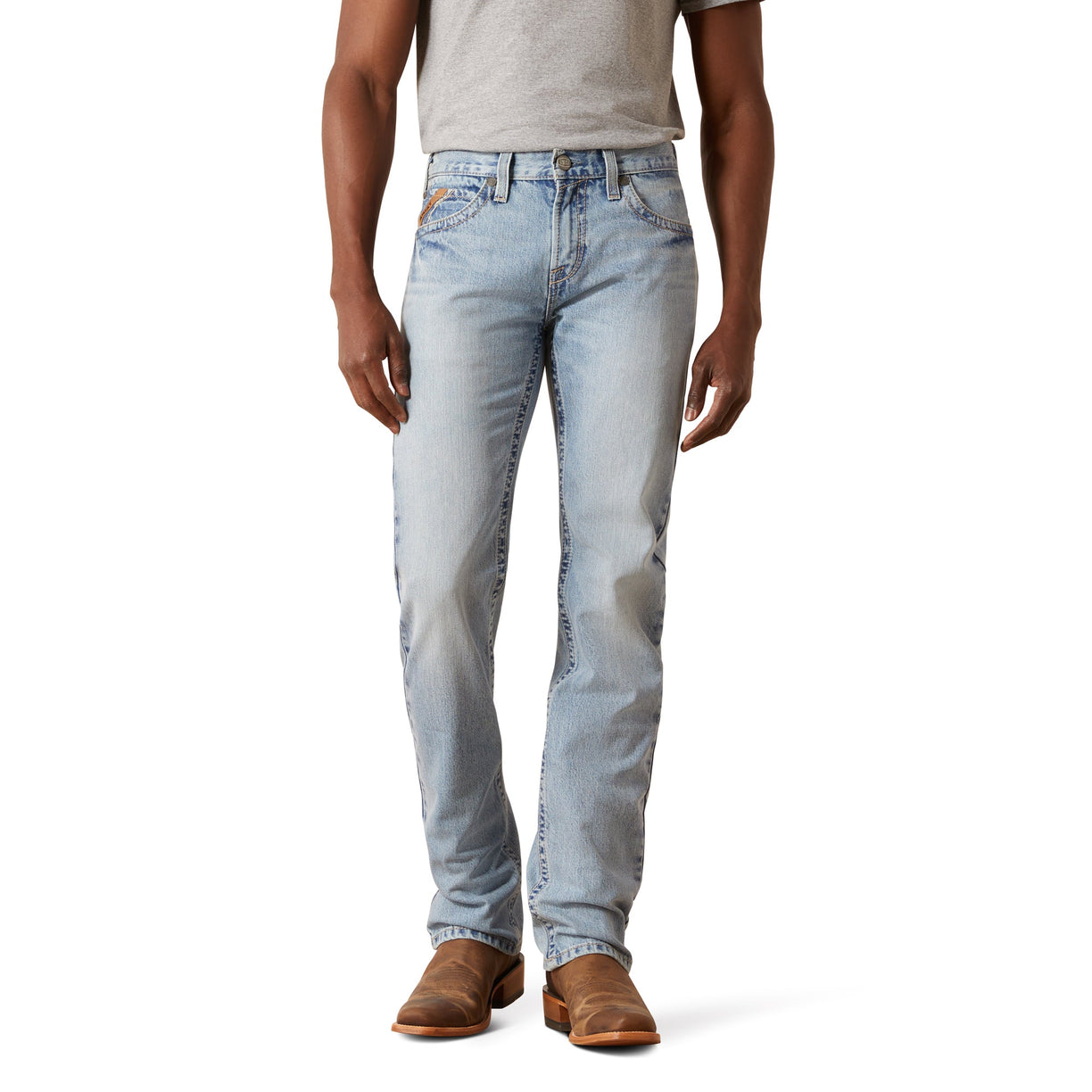 Light blue jeans worn by a person on a white background