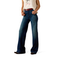 Person wearing blue jeans on a white background