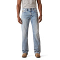 Light blue jeans worn by a person on a white background