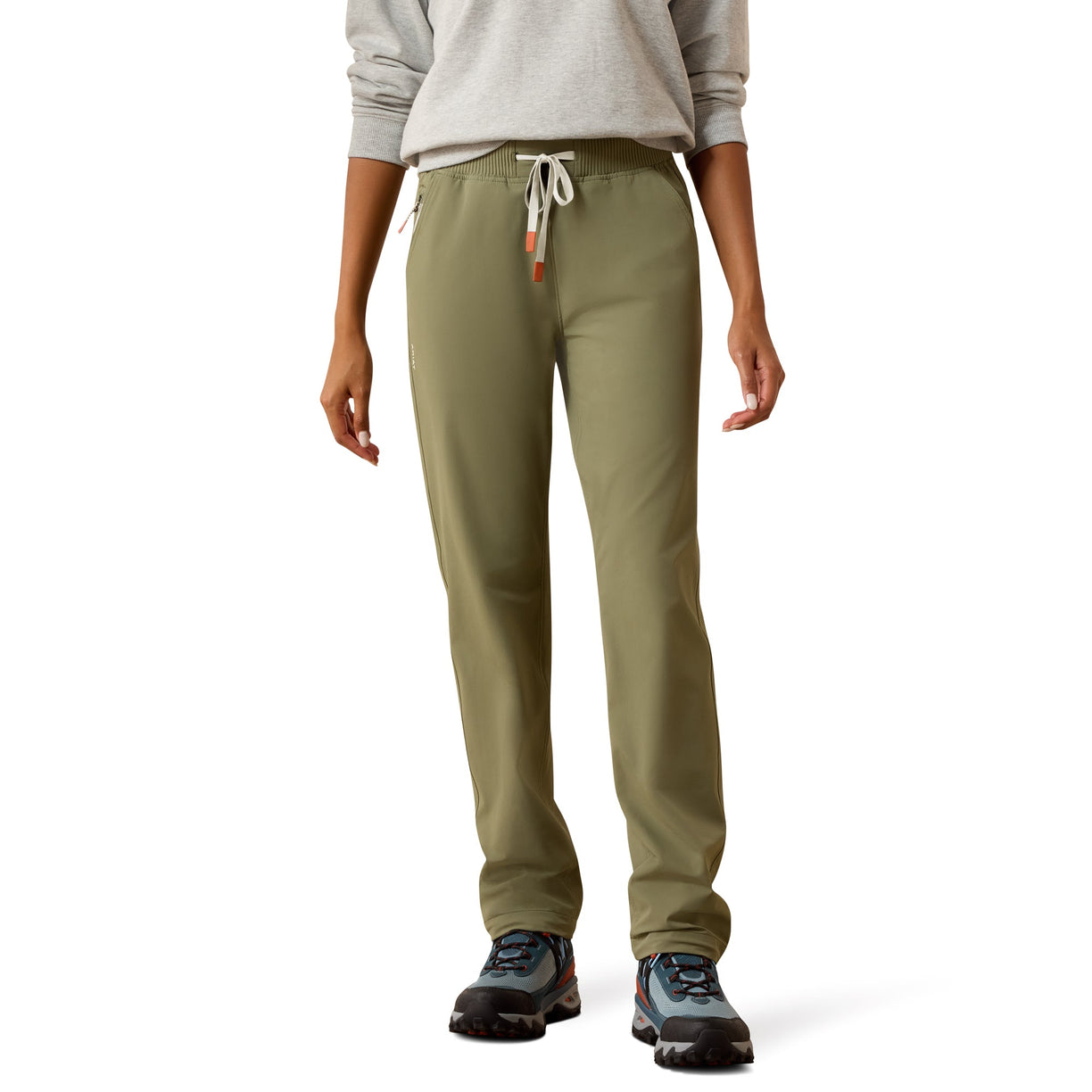 Person wearing olive green pants on a white background