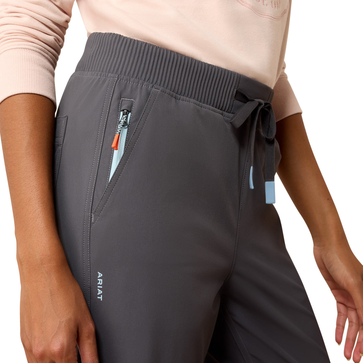 Gray pants with a brand logo on a white background
