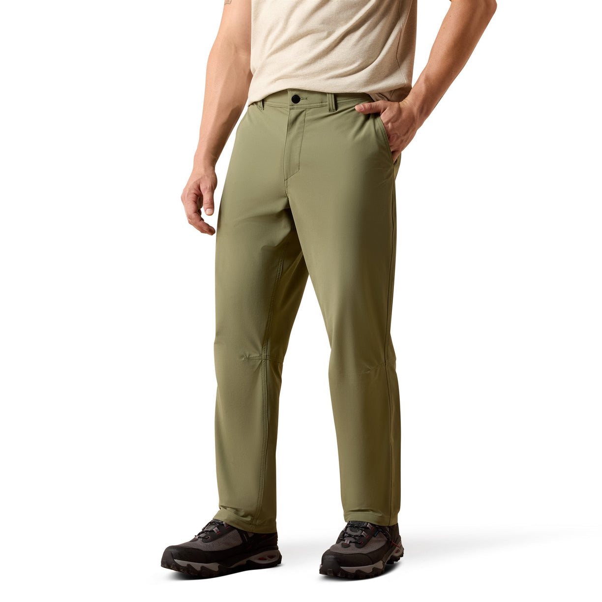Person wearing olive green pants on a white background