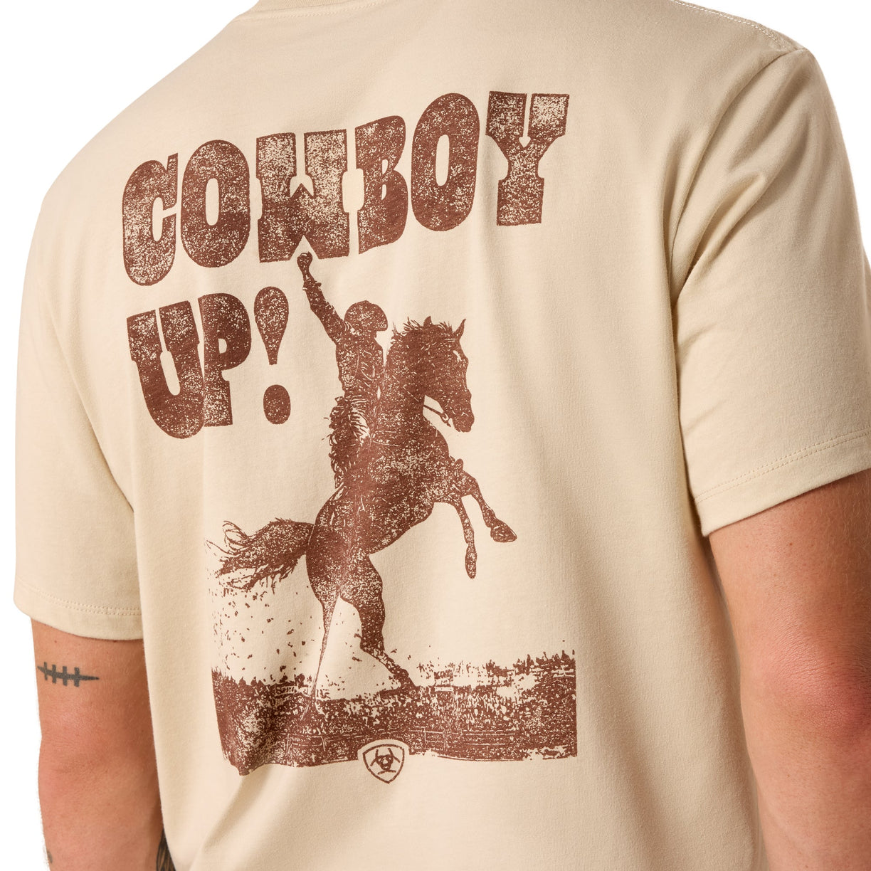 Beige t-shirt with 'Cowboy Up!' graphic and horse