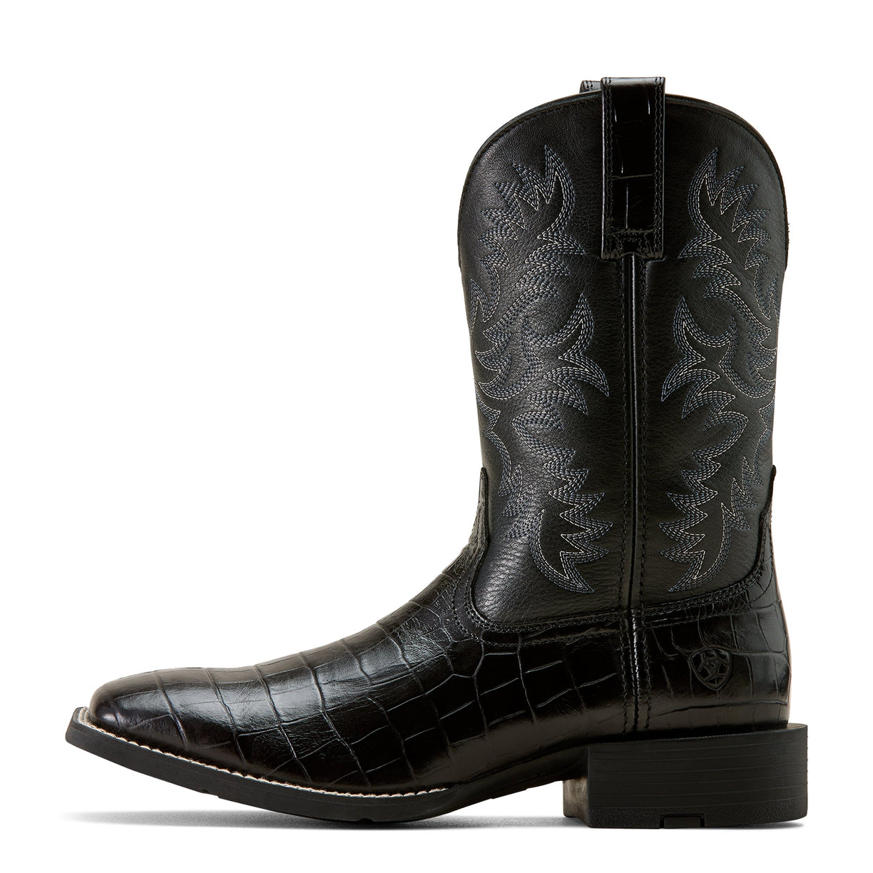 Black cowboy boot with embossed design on a white background