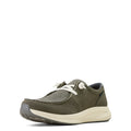 Green casual shoe with white laces on a white background