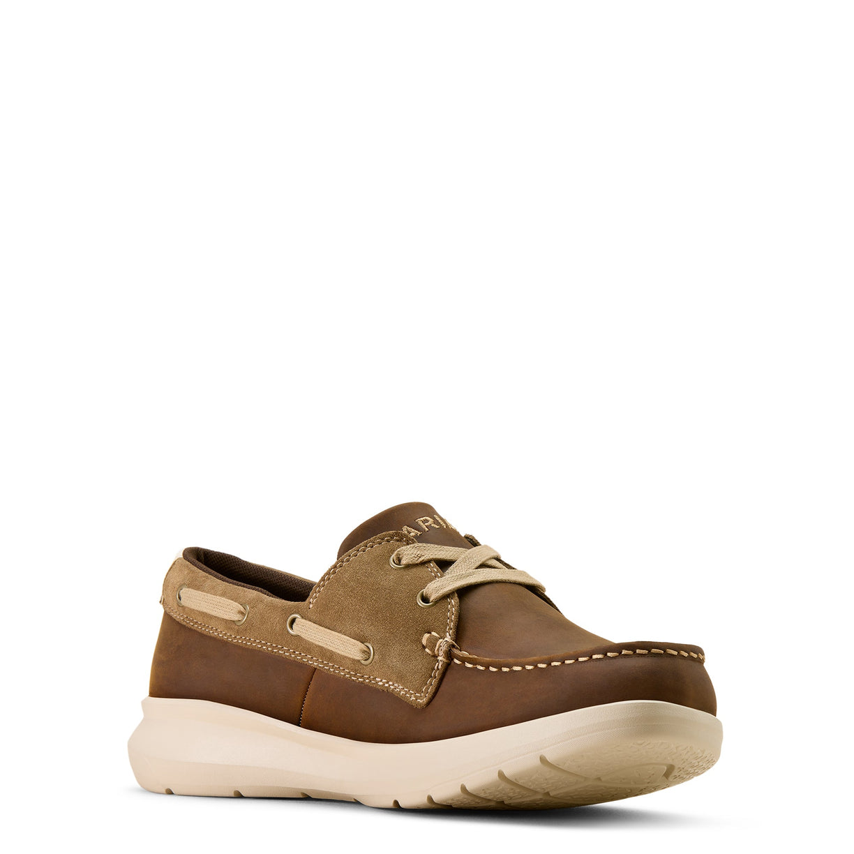 Brown leather and suede boat shoe on a white background