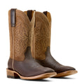 Pair of brown cowboy boots with intricate designs on a white background
