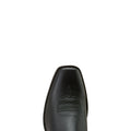 Close-up of a black leather boot sole on a white background