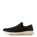 Black shoe with a white sole on a white background