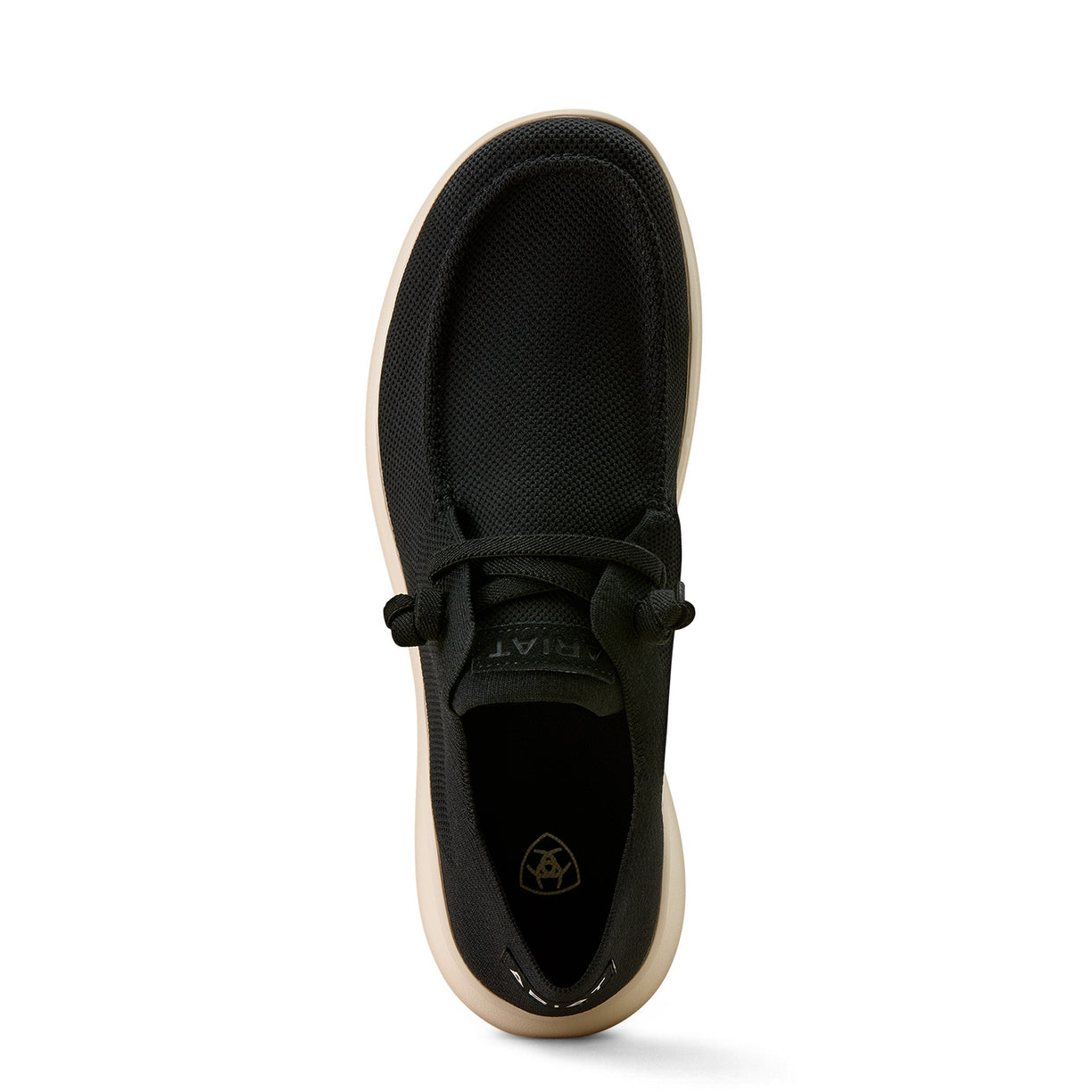 Black shoe with beige sole on a white background