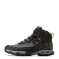 Gray and black hiking boot with red accents on a white background