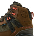 Brown Ariat boot with red laces on a beige background