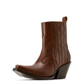Brown cowboy boot on a beige background