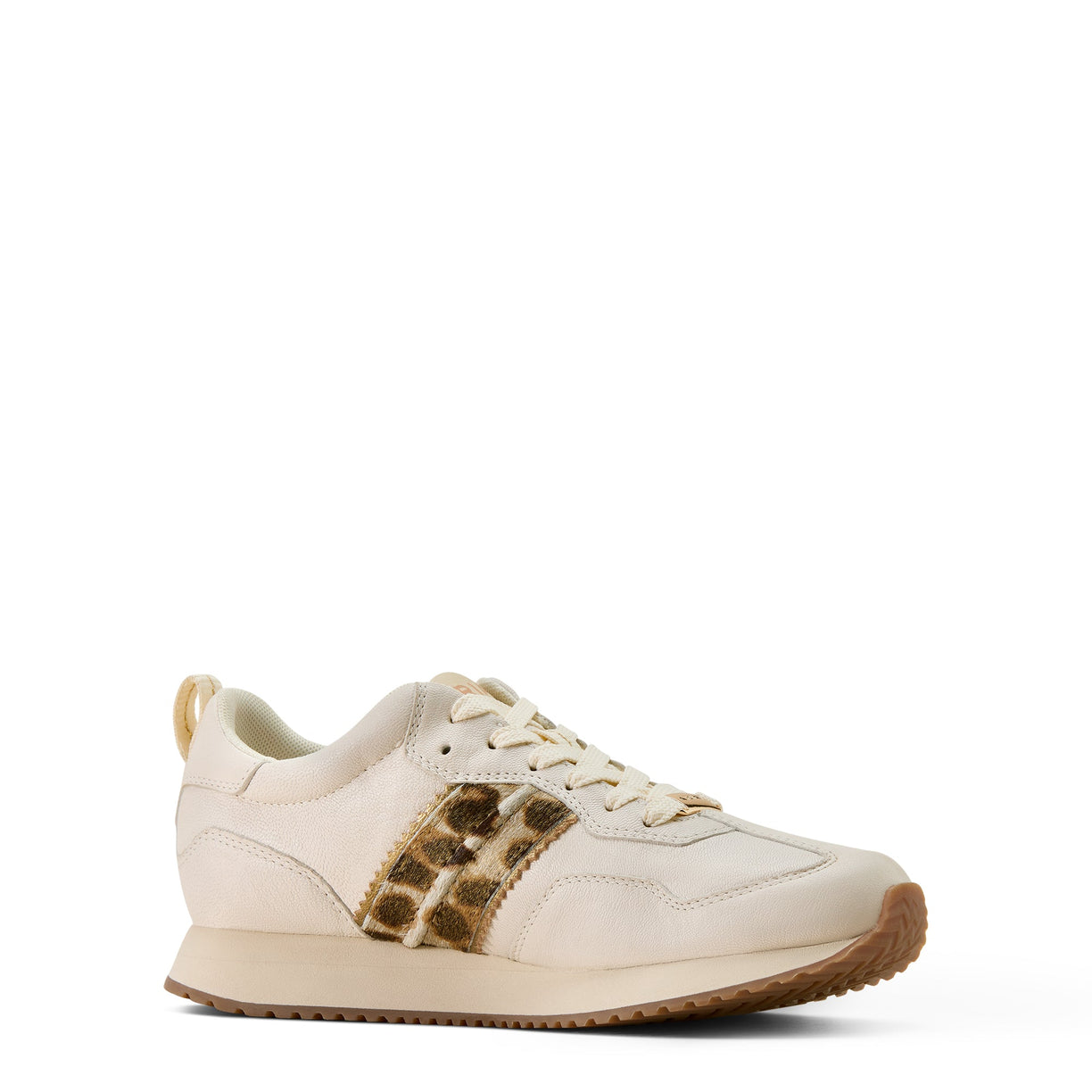 White sneaker with leopard print accents on a white background