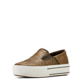 Brown slip-on shoe with patterned design on a white background