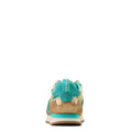 Back view of a blue and beige sneaker on a white background