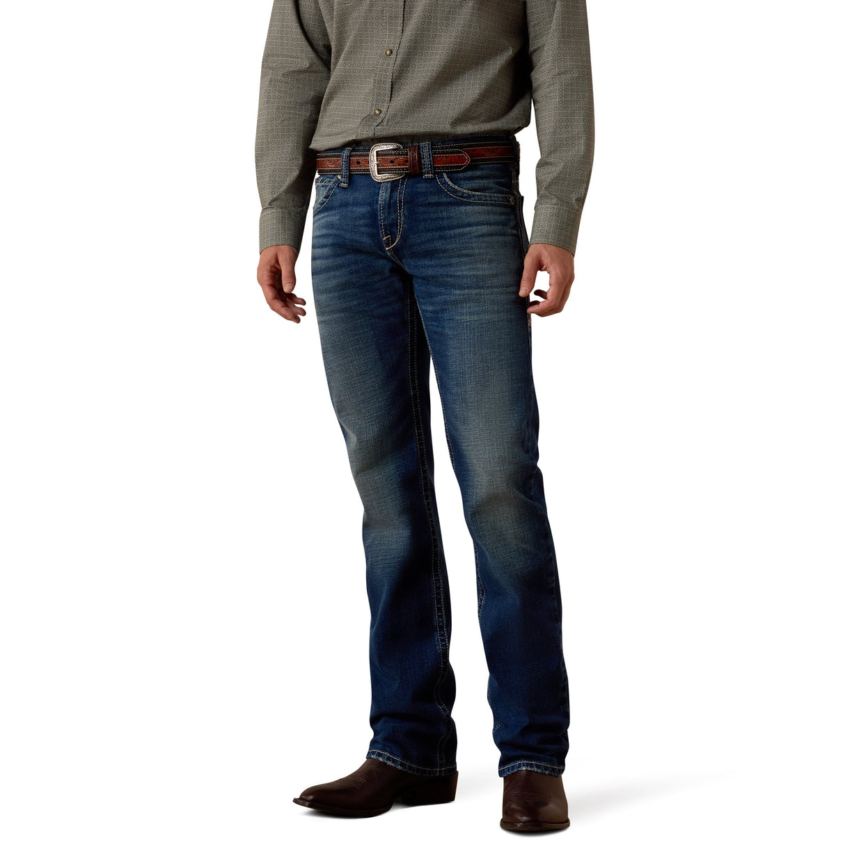 Cowboy wearing blue Ariat straight leg jeans and a green shirt on a white background