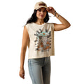 Woman wearing light cream sleeveless t-graphic shirt