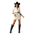 Woman wearing a white jacket, black skirt, and black boots with a cowboy hat on a white background