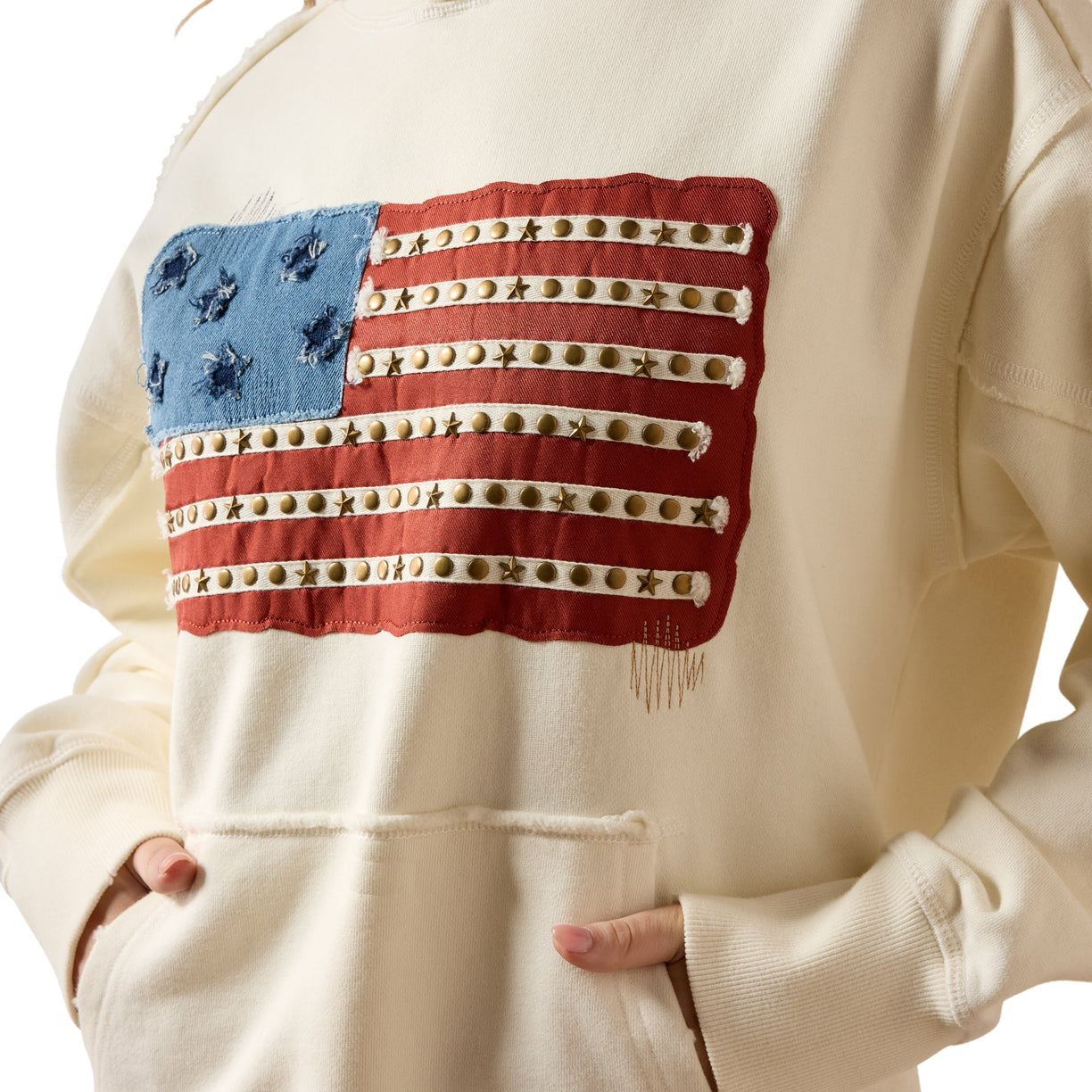 Beige hoodie with American flag patch on a white background