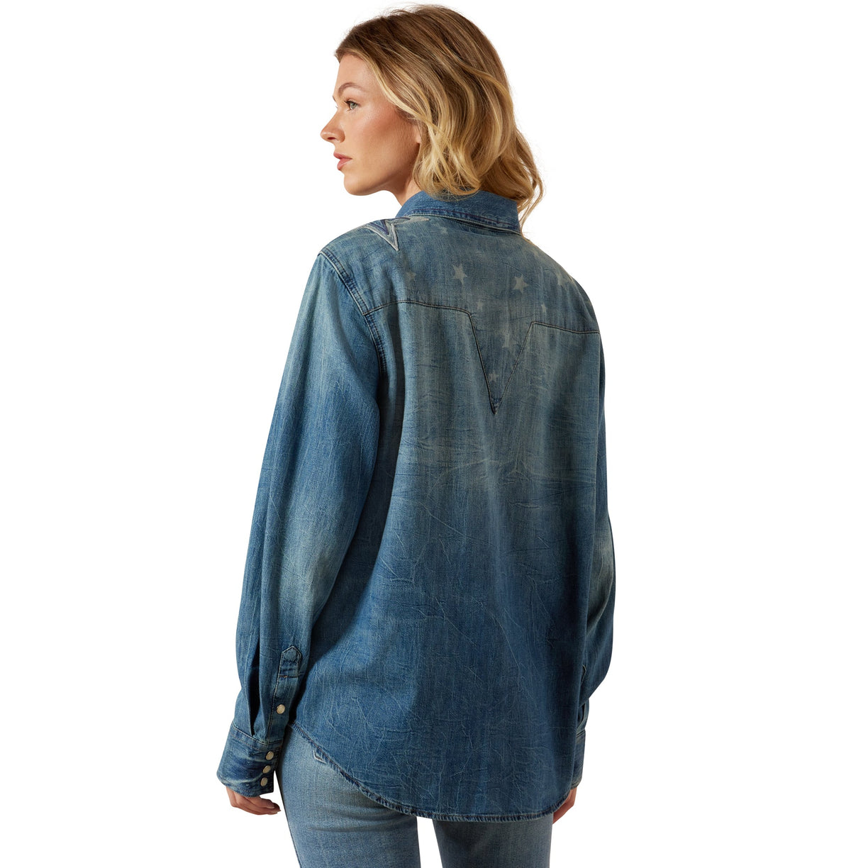 Woman wearing a blue denim shirt on a white background