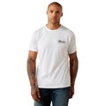 Man wearing a white t-shirt with Ariat logo on a white background