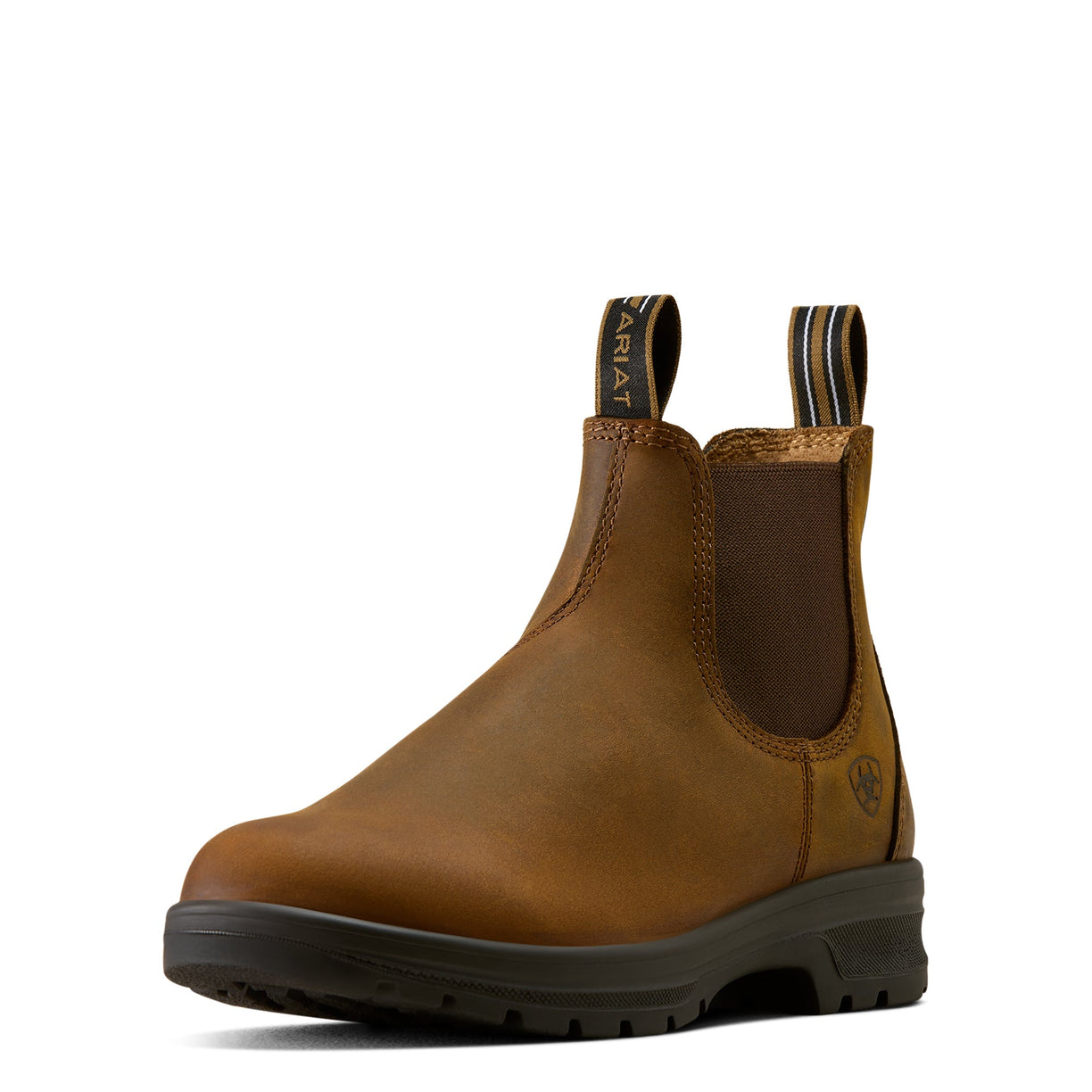 Tan leather Chelsea boot with black sole on a white background