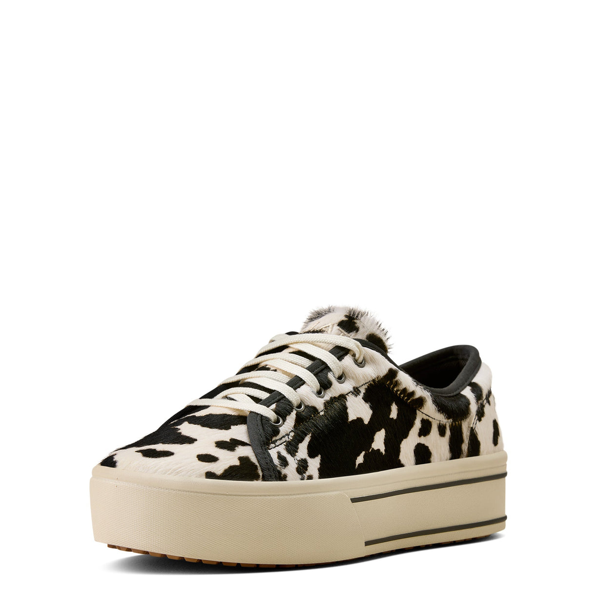 Black and white cow print sneaker on a white background