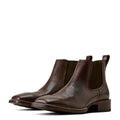 Brown leather Chelsea boot with wide square toe and western styling – shown as a pair