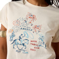 White t-shirt with patriotic design featuring horses, fireworks, and text on a person wearing it.