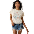 Woman wearing a white t-shirt with a graphic design on a white background