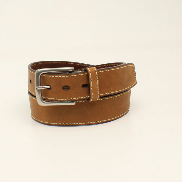 Brown leather belt with a silver buckle on a beige background