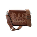 Brown leather crossbody bag with an embroidered eagle boot stitch design on the flap