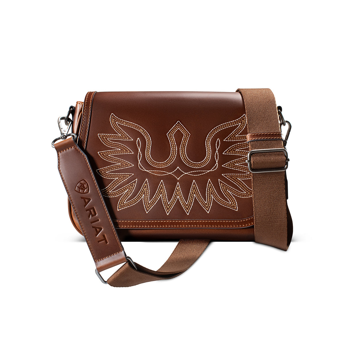 Brown leather crossbody bag with an embroidered eagle boot stitch design on the flap