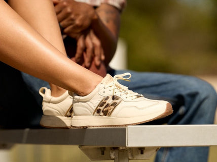 Ariat Ranch Runner - New Casual Footwear with a nostalgic, cool vibe worn by female model close up on shoes.