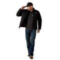 Man wearing a black jacket and cap on a white background